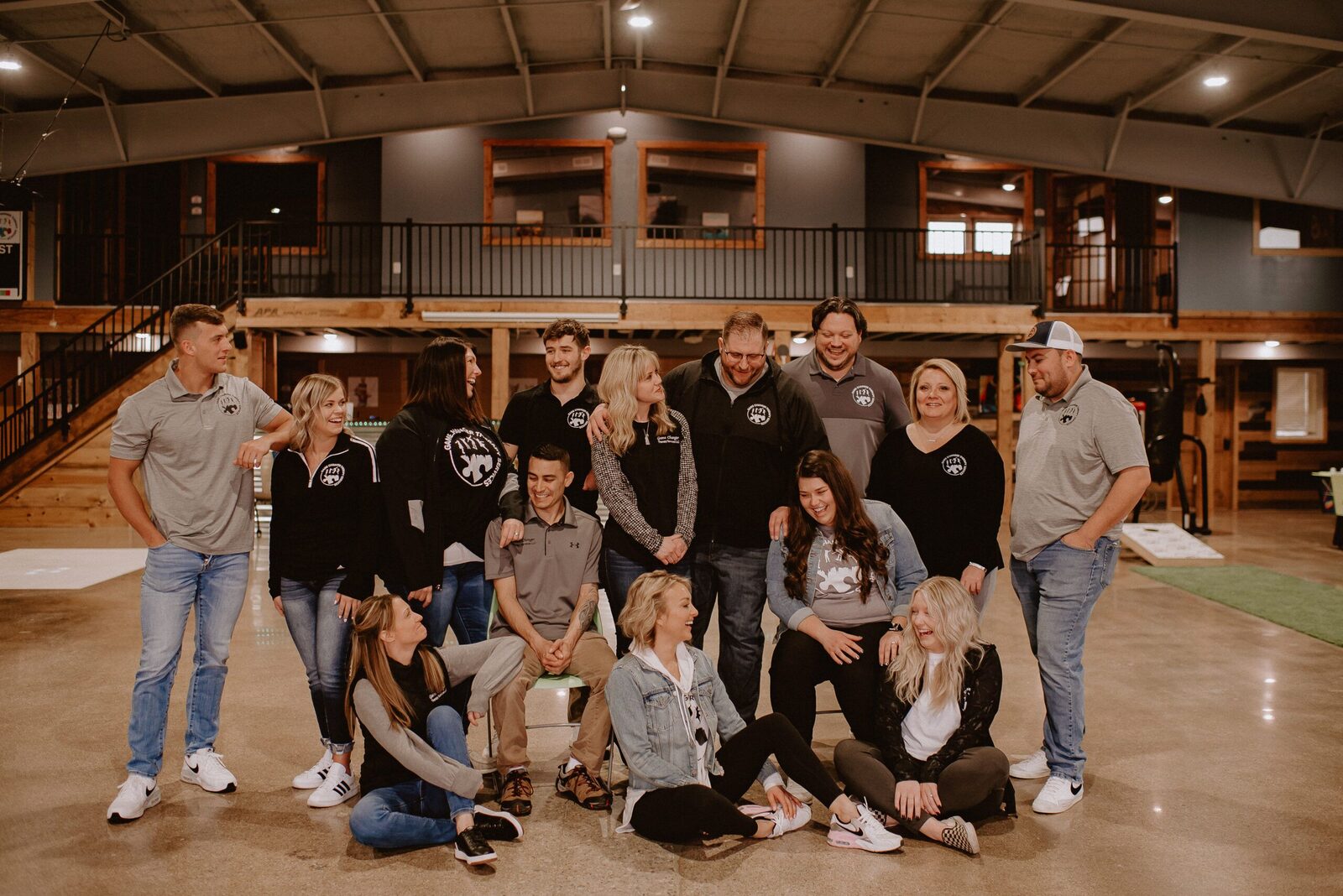 The Game Changer Therapy staff gathered together in a clinic gym